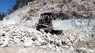 Two Bulldozers Komatsu D85E-SS and Caterpillar D6R Pushing Limestone#roadconstruction