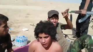 لقاء قبظ ع طفل داعشي من قبل حشد الشعبي