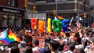 Canada’s largest Pride parade marches through Toronto