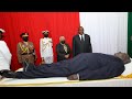 President uhuru  dp ruto view the body of former president mwai kibaki at parliament buildings