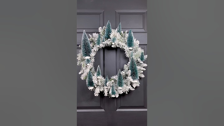 Create this stunning wreath using bottle brush trees for less than $20! 🌲 #diy #christmas #shorts