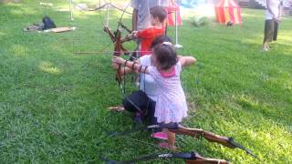 3-year-old Linna learning archery