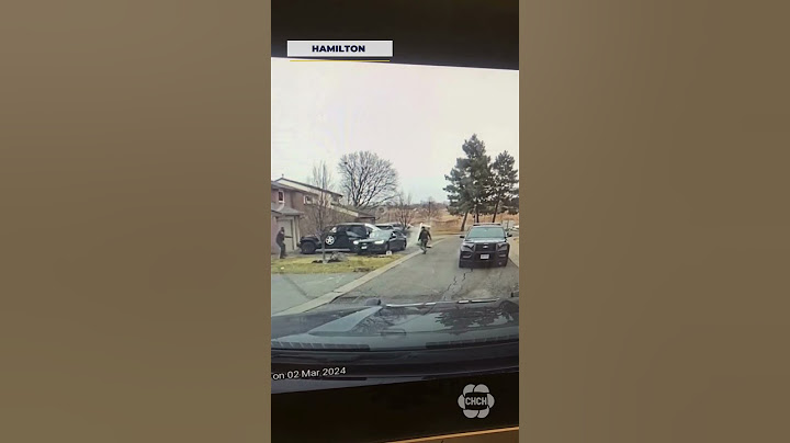 Dramatic video shows Hamilton cop being dragged by vehicle trying to flee police