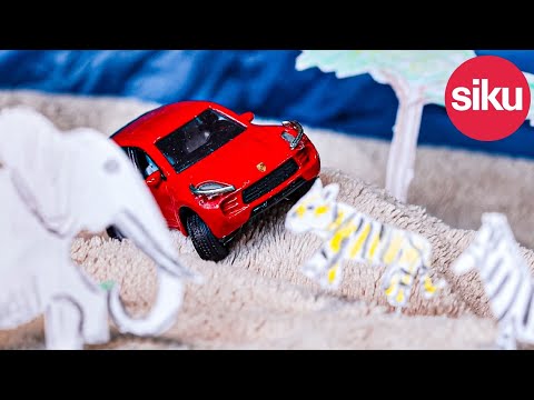 siku Porsche Macan Turbo miniature car modified for the Dakar rally 2021 with steering & suspension