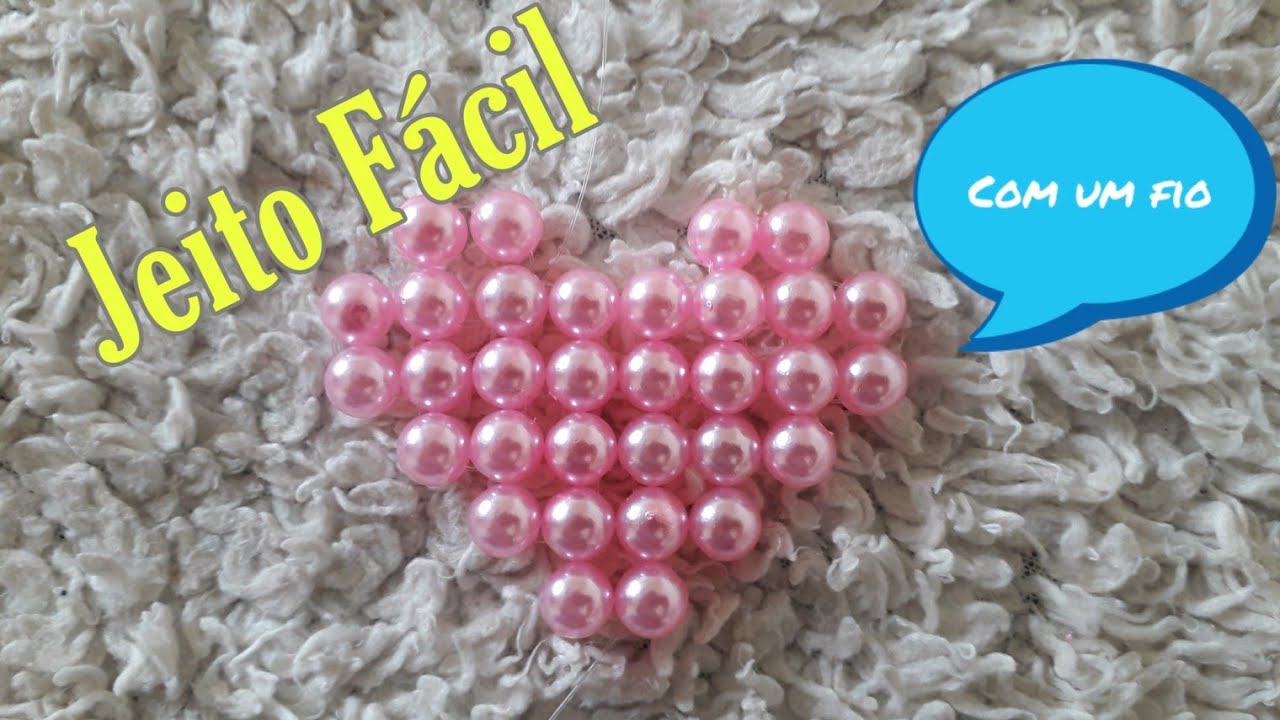 coração de pérolas com um fio
