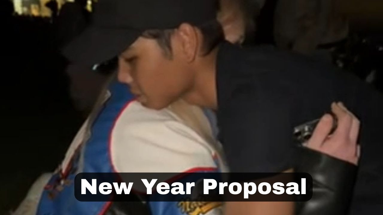 Romantic Moment: Midnight Proposal Amidst New Year Fireworks || WooGlobe
