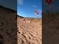 Flipping over stranger at the beach  shorts prankster