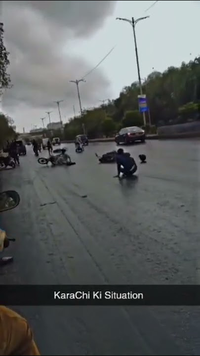 Bike Accident in Heavy Rain in  Karachi Pakistan