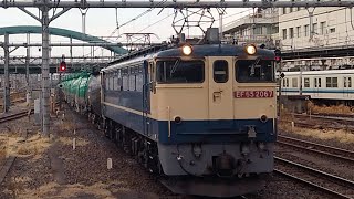 国鉄EF65形2067号機+タキ16両が大宮駅6番線を通過するシーン(臨8876列車・石油返空)2024/02/17