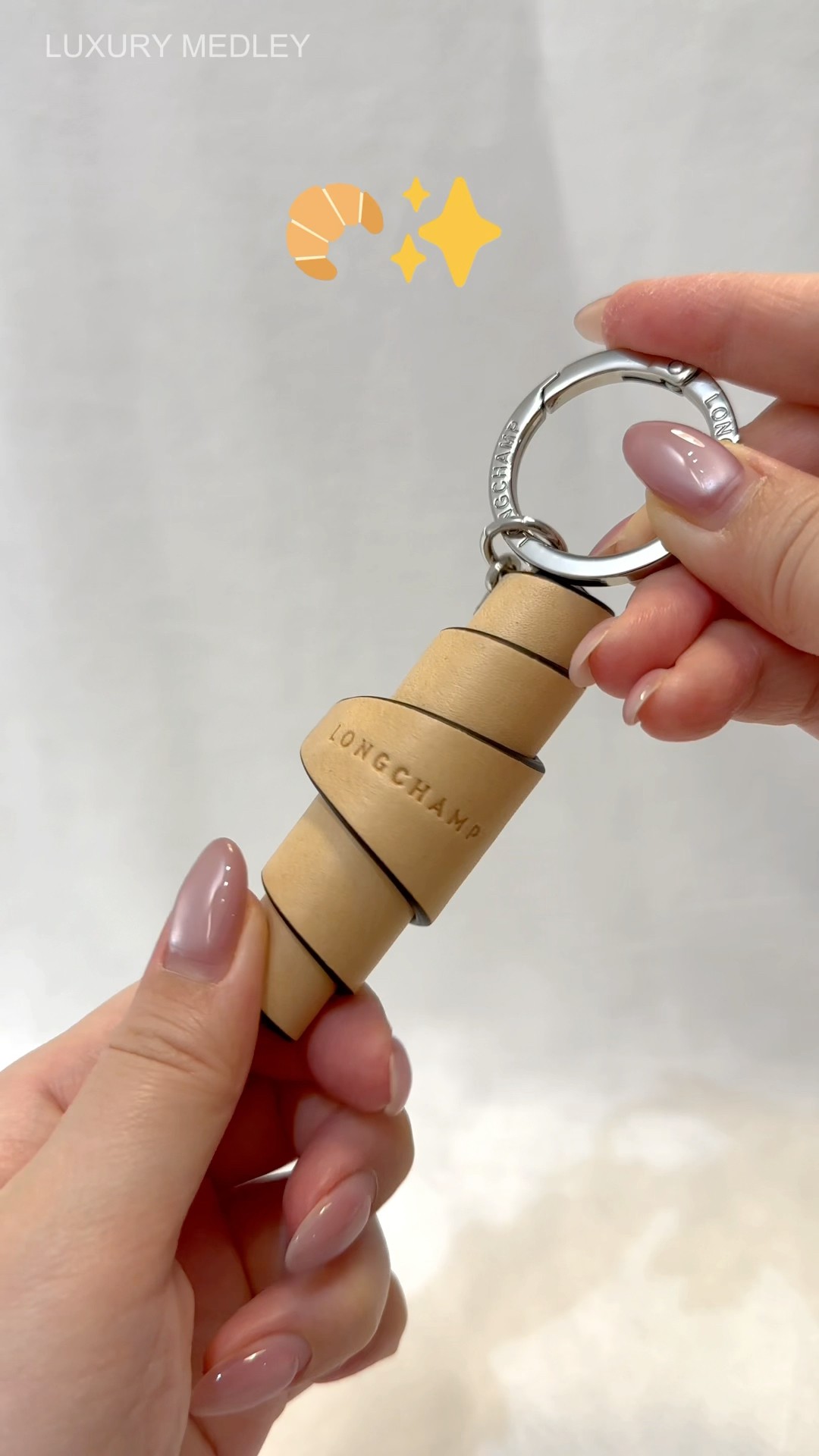 It rolls up like it's ready for the oven - cutest keychain ever