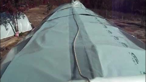 Installing a Second Layer of Greenhouse Plastic, Just Me and Him