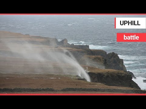 Water appears to flow BACKWARDS up a waterfall | SWNS