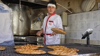 Baking local bread in Iranian bakery|local bread making video