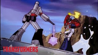 Optimus Prime vs. Megatron Top 5 Fights | Series Mashup | Generation 1 | Transformers Official Resimi