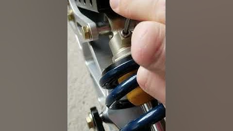 Rebound damping adjustment