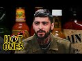 Zayn malik lets the tears flow while eating spicy wings  hot ones