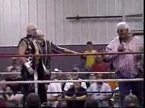 Dusty Rhodes congratulates Trevor Murdoch