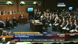 Protester at Sen. John Kerry Confirmation Hearing