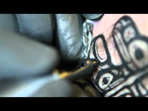 Mickey Schlick tattooing