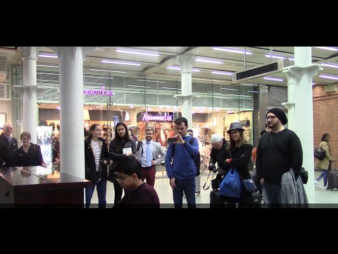 Spontaneous recital at Kings Cross St Pancras International, London - Rhys Concessao