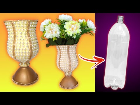 Vídeo: DIY Vasos cobertos de galho: como fazer um vaso de galho para peça central de férias