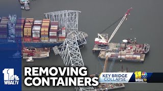 Crews work to remove containers from Dali ship, reopen channel