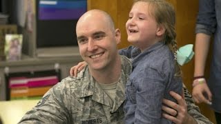 Military dad surprises daughters at school