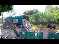 Waste Management Recycling Trucks Unloading