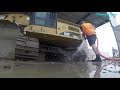 Washing Muddy Excavator