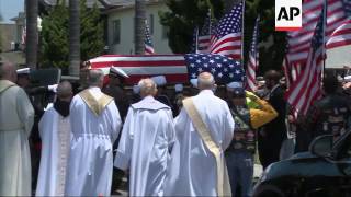 Crowds Line Streets to Honor US Navy SEAL