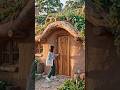 beautiful eco-friendly house built entirely from natural earth and clay, organic curved architecture