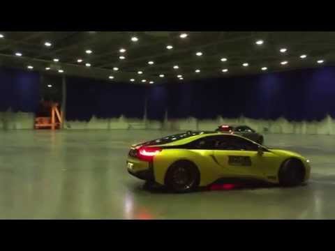 BMW i8 drifting around in an empty exhibition hall!