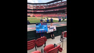 Anthony Rizzo of the Chicago Cubs negotiates Nachos for Signed Ball w/ 9yr  old Fan During Game