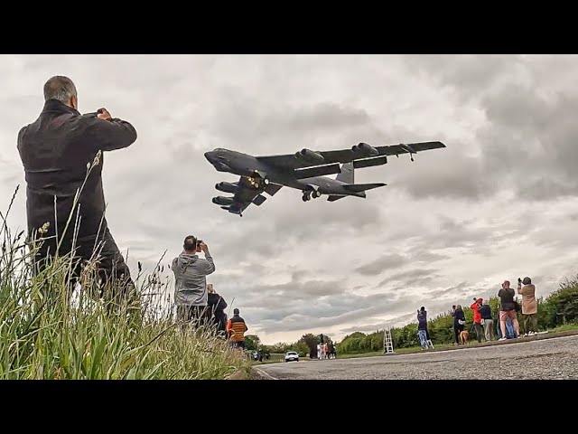 ONLOOKERS GATHER TO SEE B-52 BOMBERS AT RAF FAIRFORD - 4K class=