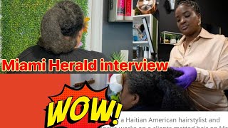 Miami Herald interview while detangling Hair.