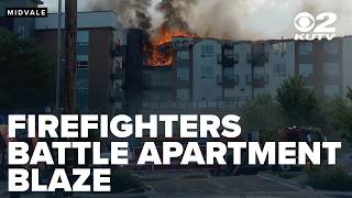 Hundreds displaced in Midvale apartment fire as crews continue to battle flames