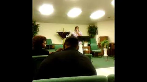 Minister Claudette Kelly giving the word
