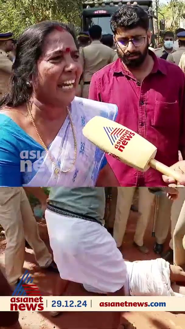 മണ്ണെടുപ്പിനെതിരെ പ്രതിഷേധം; സ്റ്റാന്റിംഗ് കമ്മറ്റി അംഗത്തെ വലിച്ചിഴച്ച്  പൊലീസ്