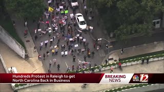 Hundreds of protesters march to demand Cooper reopen NC economy