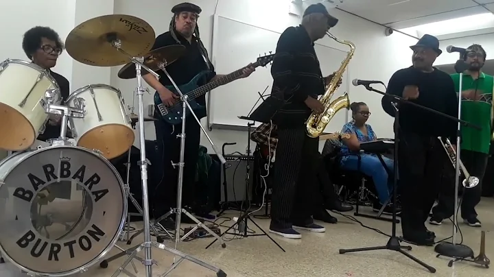 Barbara Burton, Chicago, playing drums with fellow...