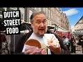 Trying dutch street food in amsterdam