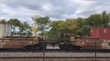 BNSF westbound intermodal train with mixed containers 2 dash 9s and an SD70ACE leading