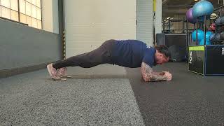 How to Do the Body Saw PlankStart in a Forearm Plank.