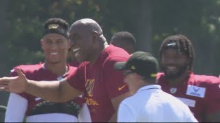Magic Johnson visits Commanders at practice