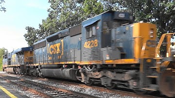 An EMD SD40-3 on a Fast CSX Auto Rack Train
