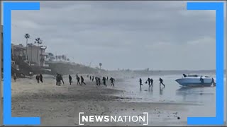 Migrants speedboat race onto California shore | NewsNation Now
