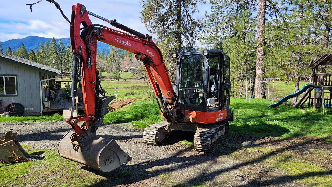 Experiment with drainage With the Kubota KX 040 4 excavator