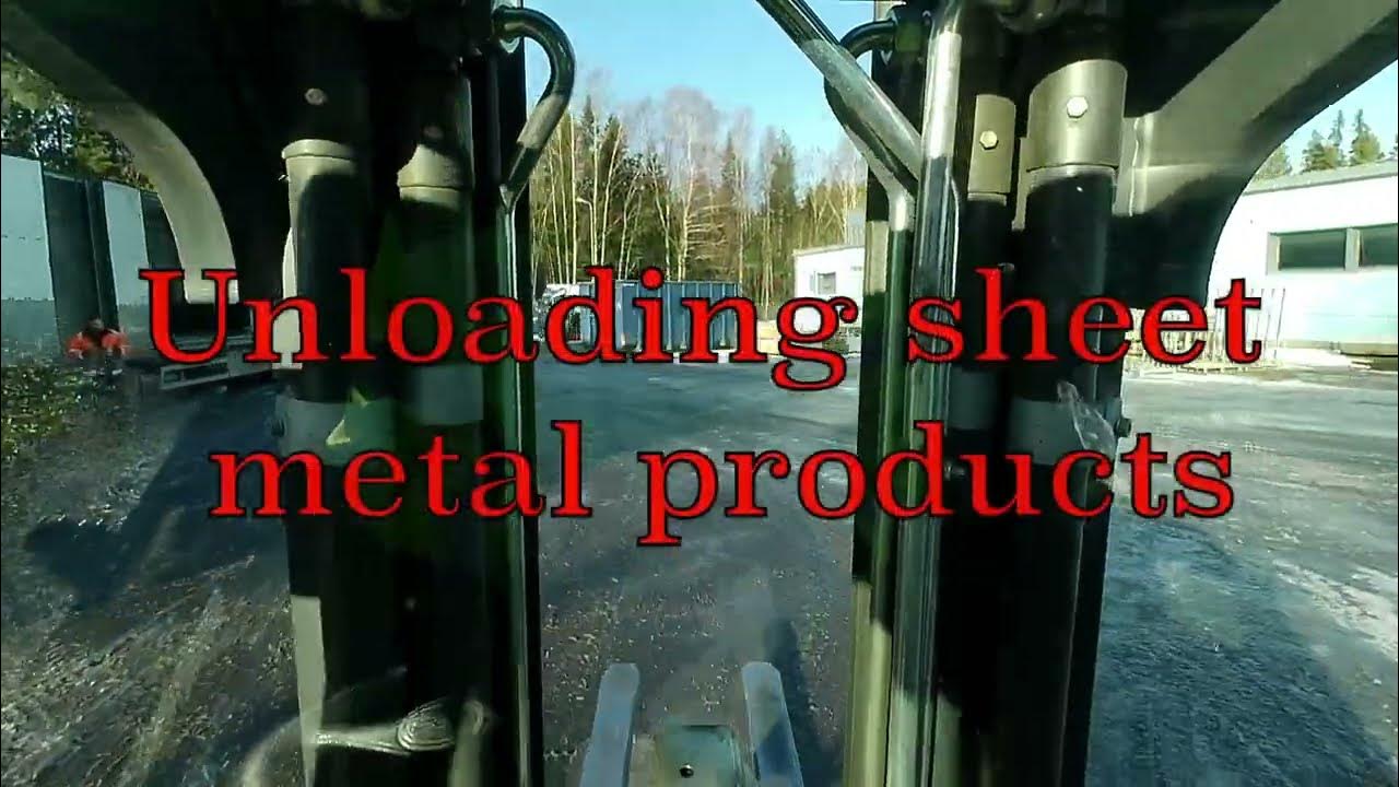 Unloading sheet metal products with forklift - YouTube