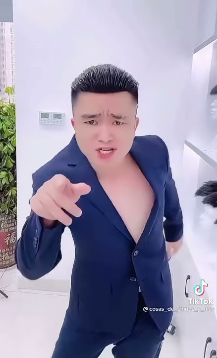 Bald Chinese guy singing