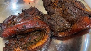 Authentic Jamaican Jerk Pork, slowly cook over pimento wood